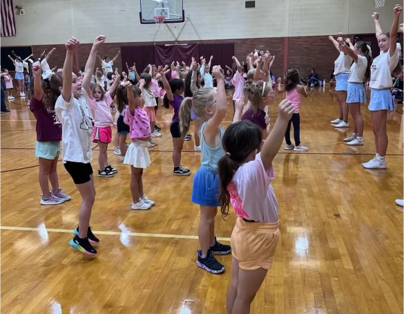 Mob of mini Mustangs pump up halftime show