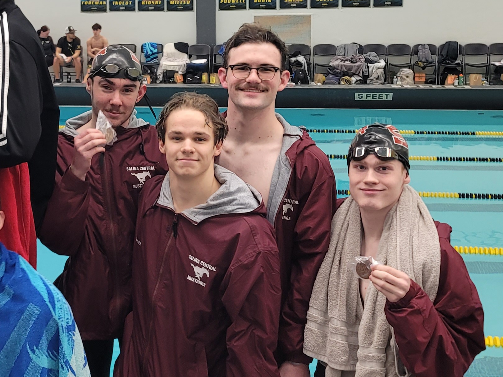 Boys swim team bids farewell after state competition