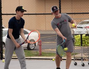 Sophomore Jonny Huseman practices with assistant coach Jeff Holgerson