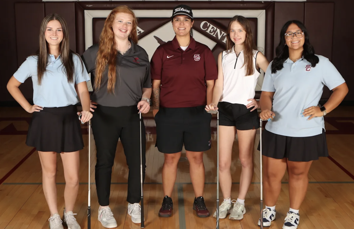 The Salina Central Women's Golf team consists of Braelyn Diggs (left), Azlan Presnell, head coach Alyssa Waldron, Eden Arb, Mya Clark