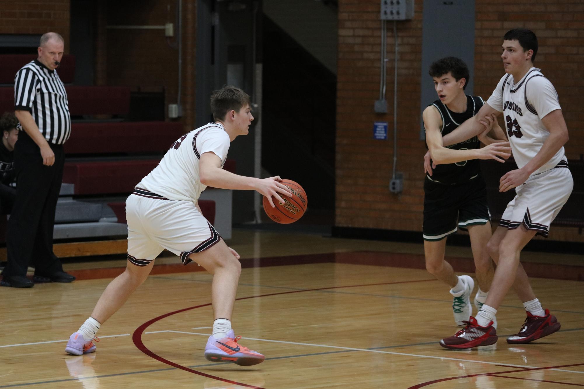 Varsity Boys Basketball vs. De Soto 1/22 (SIT) Photo Gallery