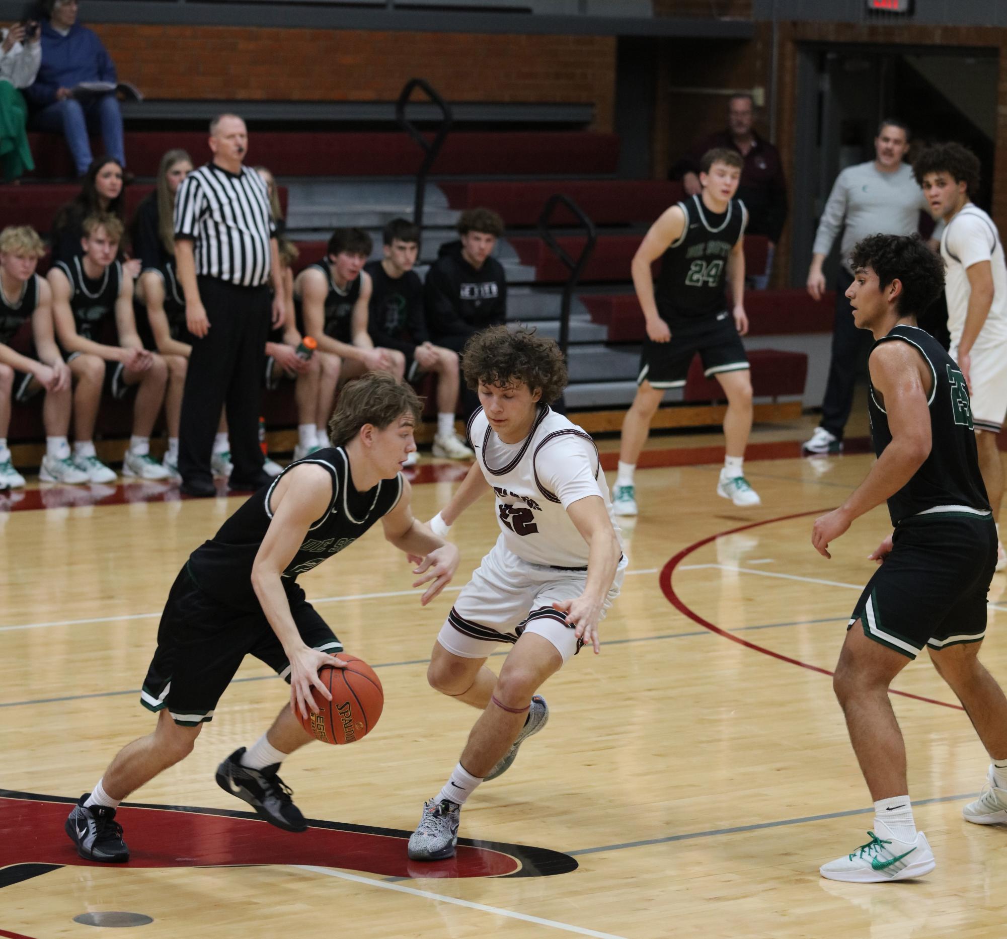Varsity Boys Basketball vs. De Soto 1/22 (SIT) Photo Gallery