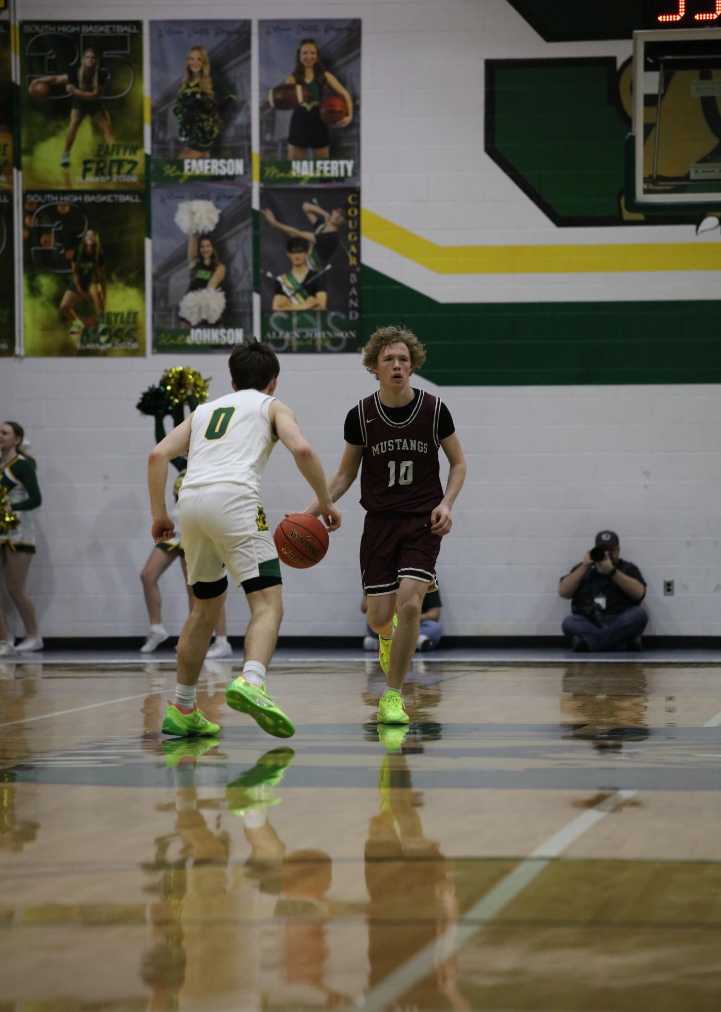 Varsity Boys Basketball vs. South 3/3 Photo Gallery